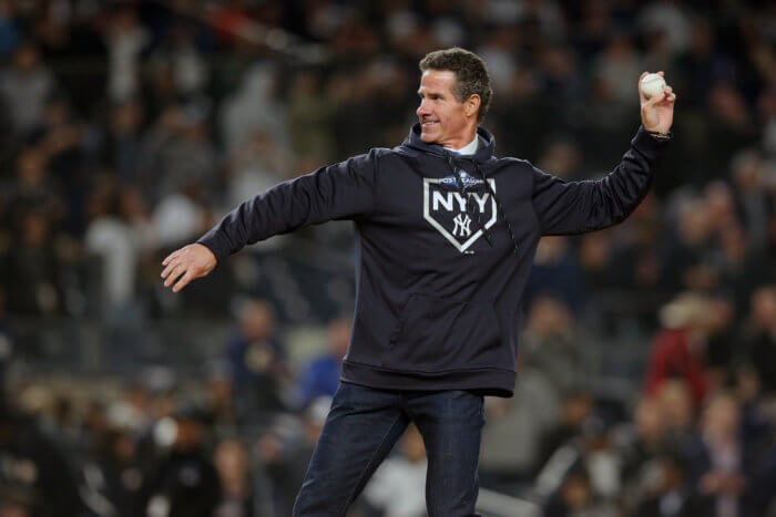 Paul O'neil throws out a first pitch at Yankee Stadium