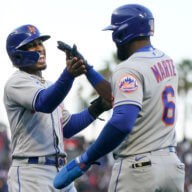 The Mets celebrate a win over San Francisco in 2022 MLB action
