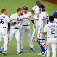 The Texas Rangers celebrate a walk-off win in 2022 MLB action